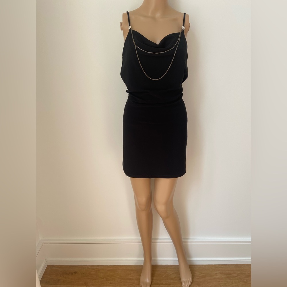 Black minidress with plunging back